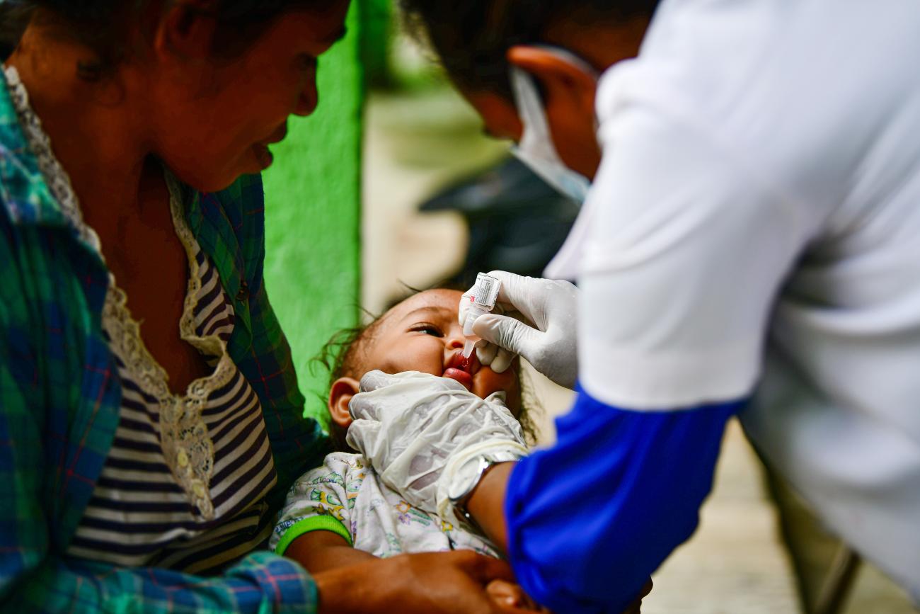 A child gets immunized during the Integrated Immunization Campaign in January in Dili, Timor-Leste. WHO Photo/Cirilo Danis