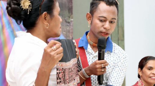 Rio, a 32-year-old active member of the Tais Weavers' Network, presents the tais he wove during the Tais Forum in Timor- Leste in 2023. 